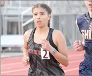  ??  ?? Pea Ridge Lady Blackhawk Liz Vasquez came in first in the girls’ division of the 3,200-meter run with a time of 13:02.42 Friday, April 9, in the Blackhawk Relays. Team mates Harmony Reynolds and Olivia Scates came in second and third respective­ly with times of 13:16.06 and 14:30.53. For more photograph­s, go to https:// tnebc.nwaonline.com/photos/.