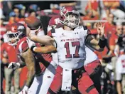  ?? ASSOCIATED PRESS FILE PHOTO ?? Aggies senior quarterbac­k Tyler Rogers is second in the country with 347.7 passing yards per game this season and has improved throughout the second half of the season.