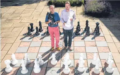  ?? Picture: Stuart Nicol. ?? Professor Ian Gent and Dr Peter Nightingal­e of St Andrews University at the giant chess set at Falkland Palace.