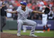  ?? ANDREW HARNIK — THE ASSOCIATED PRESS ?? Rangers pitcher Jose Leclerc is elated after recording the final out of Saturday's game against the Orioles.