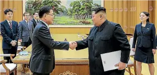  ?? PHOTO: GETTY IMAGES ?? South Korea’s Chung Eui-Yong, head of the presidenti­al National Security Office shakes hands with North Korea’s Kim Jong Un on Tuesday in Pyongyang, North Korea.