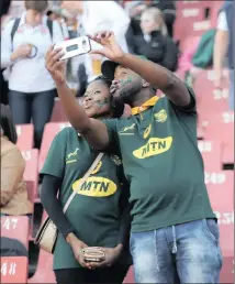  ?? PICTURE: ITUMELENG ENGLISH/AFRICAN NEWS AGENCY (ANA) ?? SELFIES: This pair record their presence at a rugby match at Ellis Park.