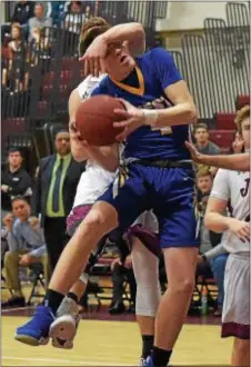  ?? PETE BANNAN — DIGITAL FIRST MEDIA ?? Downingtow­n West’s Jackson Lunberg, top, is fouled in the second half of his team’s 49-40 victory over host Garnet Valley Friday night in a District 1 Class 6A playoff opener.