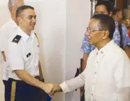  ??  ?? Joint US Military Assistance Group’s Col. Stephen Ma with former Vice President Jejomar Binay.