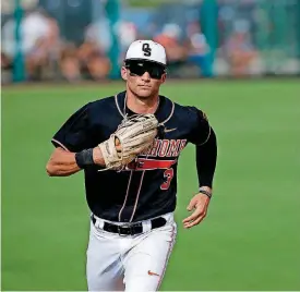  ?? [PHOTO BY MITCHELL ALCALA, FOR THE OKLAHOMAN] ?? Outfielder Garrett McCain has consistent­ly produced for the Cowboys in a breakout season.