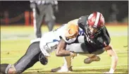  ?? Steven Eckhoff ?? Rabun County senior receiver Adriel Clark makes a catch during Rabun County’s Sweet 16 matchup against the Model Blue Devils on Friday in Tiger. Clark had three touchdown receptions in the game, bringing his season total to 27.