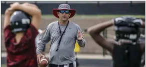  ?? (Arkansas Democrat-Gazette/John Sykes Jr.) ?? Joe T. Robinson Coach Todd Eskola (center), shown here in 2018, said the decision to move the Senators’ season opener against Pulaski Academy from today to Friday was made as the result of “a very fast-moving situation.”