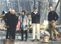  ?? AP PHOTO/EVAN VUCCI ?? From left, California Gov.-elect Gavin Newsom, California Gov. Jerry Brown, Paradise Mayor Jody Jones, President Donald Trump and FEMA Administra­tor Brock Long visit a wildfire-ravaged neighborho­od Saturday in Paradise. Calif.