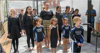  ??  ?? Right: Kapa Haka group Te Kohitanga perform at the opening of the Korimako Lane with Otis Cleaver, 11, leading the singing.