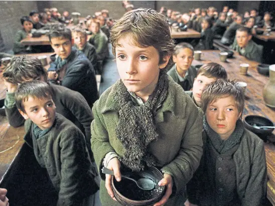  ??  ?? HUNGRY: Like Charles Dickens’ Oliver Twist, 2.5 million children in Britain are affected by ‘food insecurity’ – or hunger to you and me.