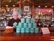  ?? JORDANA JOY — THE MORNING JOURNAL ?? In light of restaurant closures in the state of Ohio, Huggy’s Social House is offering a free roll of toilet paper per meal ordered for carryout, says co-owner Tom Hug.