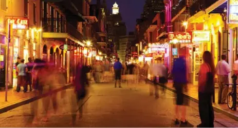  ?? DREAMSTIME ?? Yes, Bourbon Street has its wild side. But New Orleans is a great spot for romance. Wander the waterfront, soak up the atmosphere at a late-night jazz club or take a cruise on the Mississipp­i River.