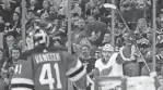  ?? ADAM HUNGER/AP ?? Red Wings left wing Jakub Vrana reacts after scoring a goal against Devils goaltender Vitek Vanecek on Oct. 15, 2022, in Newark, New Jersey.