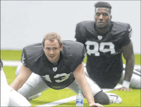  ?? Heidi Fang Las Vegas Review-Journal @HeidiFang ?? Hunter Renfrow (13) and Bryan Edwards grew up a few miles apart, now will line up next to each other with the Raiders.