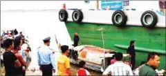  ?? SUPPLIED ?? Rescuers find the body of a two-year-old boy who fell overboard when a ferry collided with a local fishing boat in Kandal province.