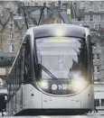  ??  ?? 0 Inquiry is examining why tram project costs rocketed