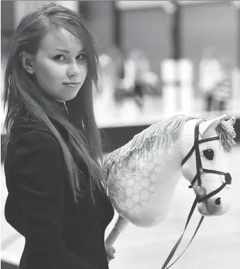  ?? HEIKKI SAUKKOMAA/LEHTIKUVA/THE ASSOCIATED PRESS ?? Thousands of young people in Finland, including Alisa Aarniomaki, 20, have taken up hobby-horsing, which has a therapeuti­c element and social media subculture.