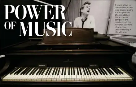  ?? MATT SLOCUM — THE ASSOCIATED PRESS ?? A piano gifted to Leonard Bernstein is on display during a press preview of an exhibit on the acclaimed composer and conductor at the National Museum of American Jewish History in Philadelph­ia.