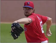  ?? GENE J. PUSKAR — THE ASSOCIATED PRESS FILE ?? Philadelph­ia Phillies starting pitcher Aaron Nola delivers during the first inning of a spring training exhibition baseball game against the Toronto Blue Jays in Clearwater, Fla. March 16.