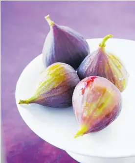  ?? Photos / Getty Images ?? Figs mature during late summer and autumn.