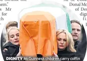  ??  ?? DIGNITY Mcguinness children carry coffin