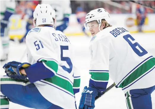  ?? — GETTY IMAGES FILES ?? The Canucks new generation, including Troy Stecher and Brock Boeser, is supported by a dedicated staff, many of whom have played for the team in the past. “They were Canucks and they care about this team,” says GM Jim Benning.