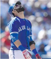  ?? FRANK GUNN/THE CANADIAN PRESS ?? The reaction of Toronto Blue Jay Jose Bautista after a strikeout reflects the offensive swoon the Jays are in following a big offensive season in 2015.