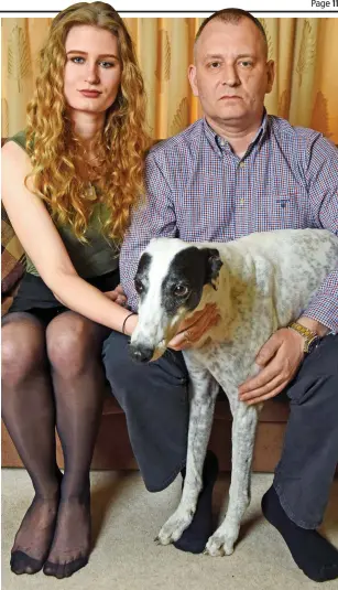  ??  ?? Devastated: Peter Wilkinson with his daughter Lydia and dog Mandy