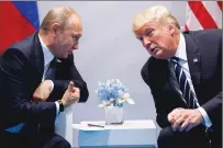  ?? Associated Press ?? President Donald Trump meets with Russian President Vladimir Putin at the G20 Summit on Friday in Hamburg, Germany.