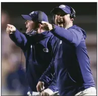  ?? (NWA Democrat-Gazette/Charlie Kaijo) ?? Chris Young (right) led Greenwood to its 10th state championsh­ip in his first season as the Bulldogs’ head coach last year. Greenwood graduated several key players from last year’s team, but it opens the season as the No. 1 team in Class 6A.