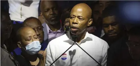  ?? AP FILE ?? WHO WON? Candidates Eric Adams and, below, Maya Wiley are seen at election night parties in New York. The city’s mayoral election, using ranked choice voting for the first time, has not gone smoothly.