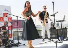  ?? Virendra Saklani/Gulf News ?? ■ Live band performing at Breakfast With Stars ahead of Dubai World Cup at Meydan yesterday.