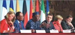  ?? LUDOVIC MARIN / AFP ?? European and African leaders meet at the Elysee Palace in Paris on Monday to try to build a “new relationsh­ip” to stem the flow of migrants into Europe.