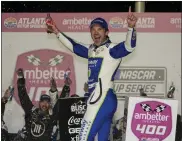  ?? JOHN BAZEMORE — THE ASSOCIATED PRESS ?? Daniel Suarez reacts after winning the NASCAR auto race at Atlanta Motor Speedway Sunday in Hampton, Ga.