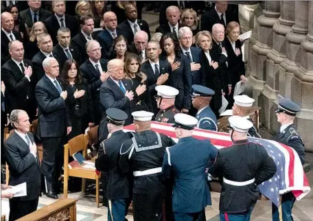  ?? Carolyn Kaster Associated Press ?? THE FIVE living fellow presidents, including son George W. Bush, left, pay tribute to President Bush at Washington National Cathedral.