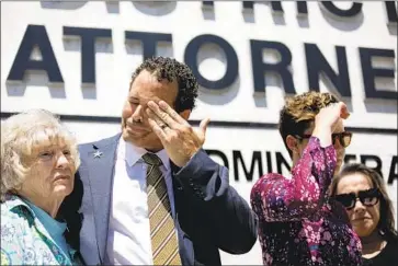  ?? Liz Moughon Los Angeles Times ?? RELATIVES OF 17-year-old Hannah Williams — grandmothe­r Lynn Williams, left, father Benson Williams, sister Nyla Williams and mother Pilar Looney — attend a news conference about Hannah’s killing by police.