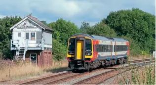  ?? ?? Right: East Midland Railway 158812 works a Nottingham to Worksop service past the signalbox at Elmton & Creswell Junction, near Creswell station on August 23. The Robin Hood Line signalbox is due to be abolished in the next few months. Dafydd Whyles