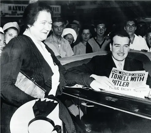  ?? HULTON- DEUTSCH COLLECTION / CORBIS / CORBIS VIA GETTY IMAGES FILES ?? Adolf Hitler’s nephew William Patrick Hitler, above, goes o  to join the U. S. navy to fight Germany during the Second World War as his mother Bridget stands by him. Below: Part of the six-page spread “Why I hate my uncle,” written by William, and...