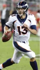  ?? | AP ?? Broncos quarterbac­k Trevor Siemian looks for a receiver during a preseason game Saturday against the 49ers.