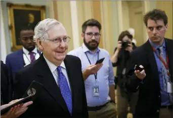  ?? PATRICK SEMANSKY — THE ASSOCIATED PRESS ?? Senate Majority Leader Mitch McConnell of Ky. speaks with reporters after walking off the Senate floor, Thursday on Capitol Hill in Washington.