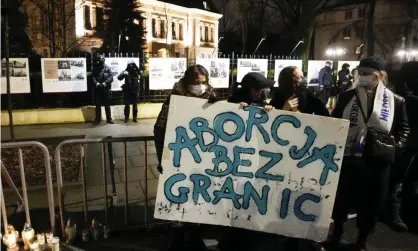  ?? January. Photograph: Czarek Sokołowski/AP ?? Activists with a sign reading ‘Abortion Without Borders’ protesting against Poland’s strict anti-abortion law at the constituti­onal court in Warsaw in