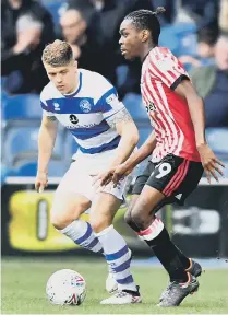  ??  ?? Joel Asoro takes on the QPR defence on Saturday. Pic: Frank Reid