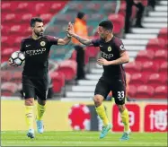  ?? Picture: GETTY IMAGES ?? HANDY PAIR: Manchester City strikers Sergio Aguero, left, and Gabriel Jesus, after a battling start, are proving to be a deadly duo playing together against opposition teams