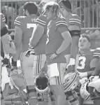  ?? ADAM CAIRNS/COLUMBUS DISPATCH ?? Ohio State quarterbac­k Quinn Ewers watches from the sideline.