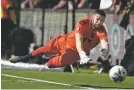  ?? JOHN MCCOY/ASSOCIATED PRESS FILE PHOTO ?? Los Angeles FC goalkeeper Maxime Crépeau blocks a shot from Austin FC during the first half of a MLS Western Conference final Oct. 30 in Los Angeles.