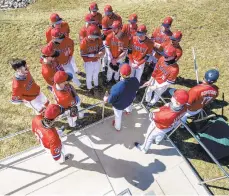  ??  ?? The team huddles together before a DeSales baseball game against Misericord­ia held at DeSales University on Saturday.