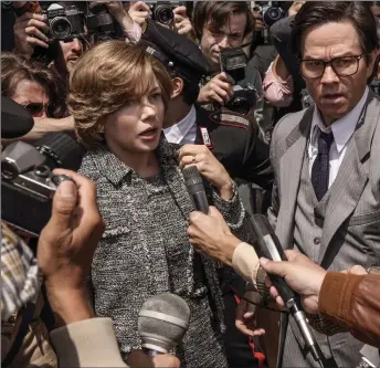 ??  ?? Michelle Williams and Mark Wahlberg in All The Money In The World, based on events surroundin­g the 1973 kidnapping of 16-year-old John Paul Getty III