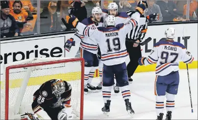  ?? AP PHOTO ?? Edmonton Oilers celebrates after center Mark Letestu (back left) scored a goal past Anaheim Ducks goalie John Gibson during Game 1 of a second-round NHL hockey Stanley Cup playoff series in Anaheim, Calif. on Wednesday.