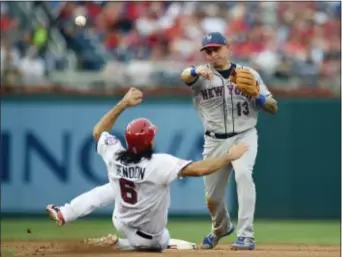  ?? NICK WASS — THE ASSOCIATED PRESS ?? Washington’s Anthony Rendon is forced out at second as Mets shortstop Asdrubal Cabrera (13) throws to first during the fourth inning of Monday’s game in Washington.