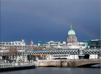  ?? REUTERS ?? A rainbow arches across the sky in Dublin, Ireland.